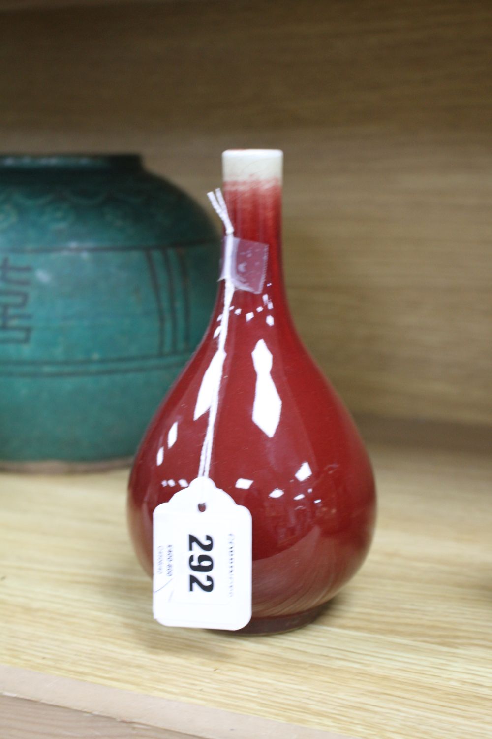 A Chinese sang de boeuf glazed langyao bottle vase, late 19th / early 20th century, H.19cm